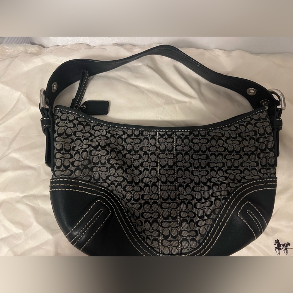 In great condition!! 
COACH Signature Canvas Hobo vintage  Shoulder Bag Black